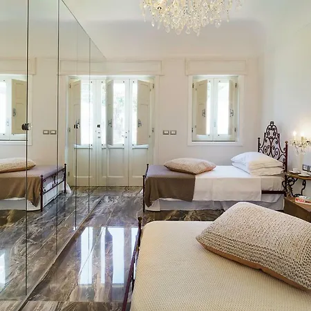 Estella Villa *